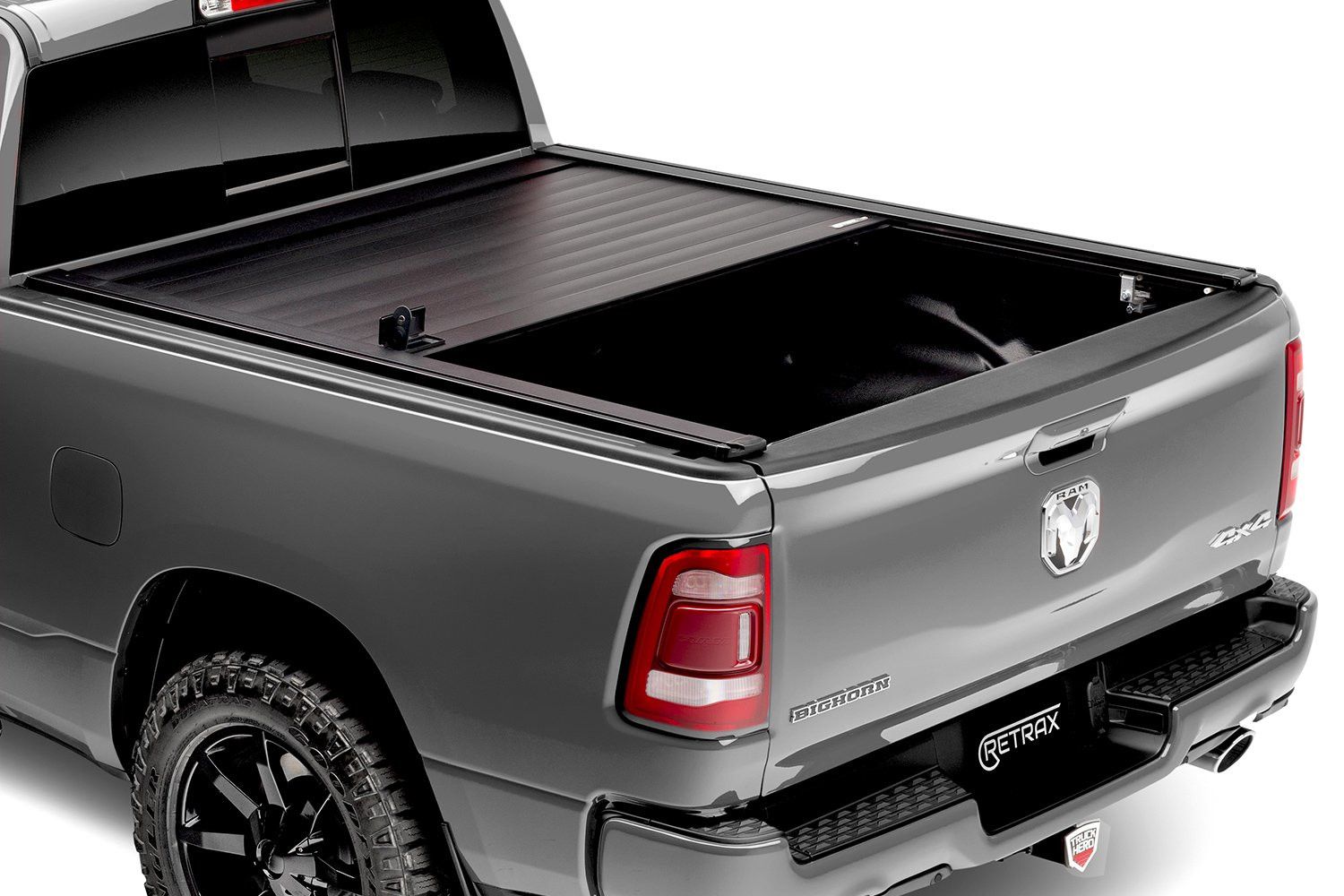 a pickup truck with a retractable bed cover