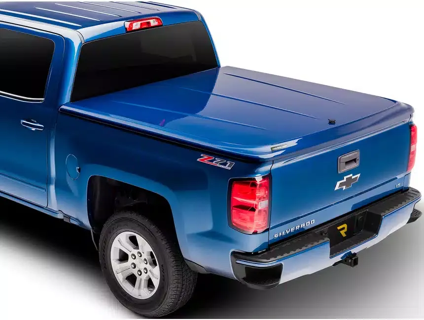 A pickup truck with a one piece bed cover